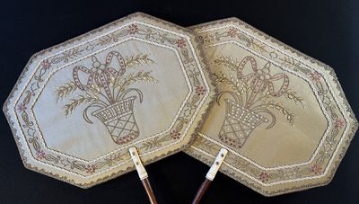A pair of embroidered silk fire screens