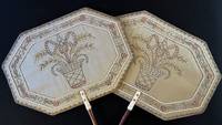 A pair of embroidered silk fire screens
