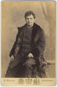 Three-quarter length cabinet card photograph in formal attire