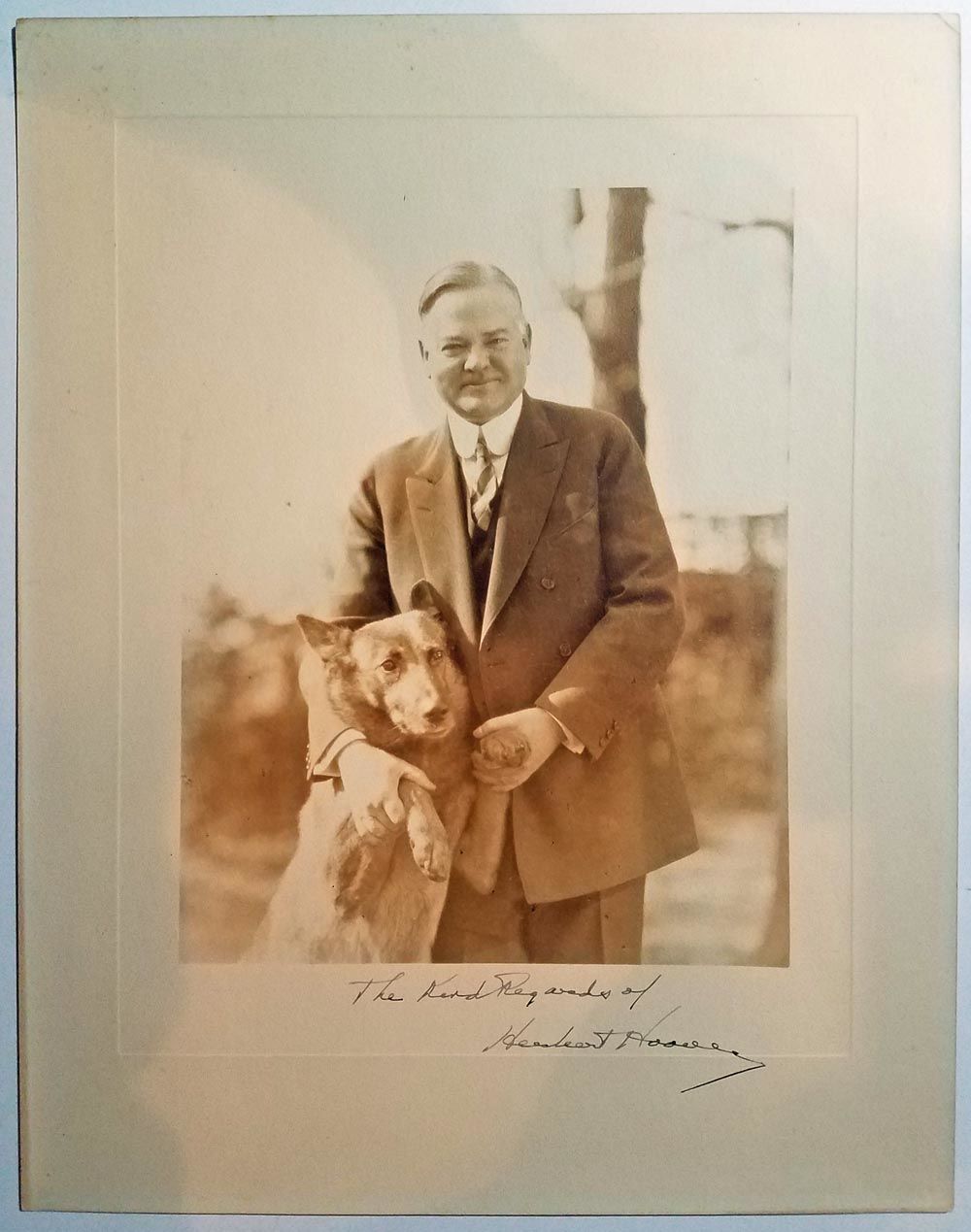 BIBLIO An Oversized Signed Photograph Of Herbert Hoover With His Dog