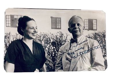 Black and White photo of the couple signed on front by White (:with warm Regards, Walter White")