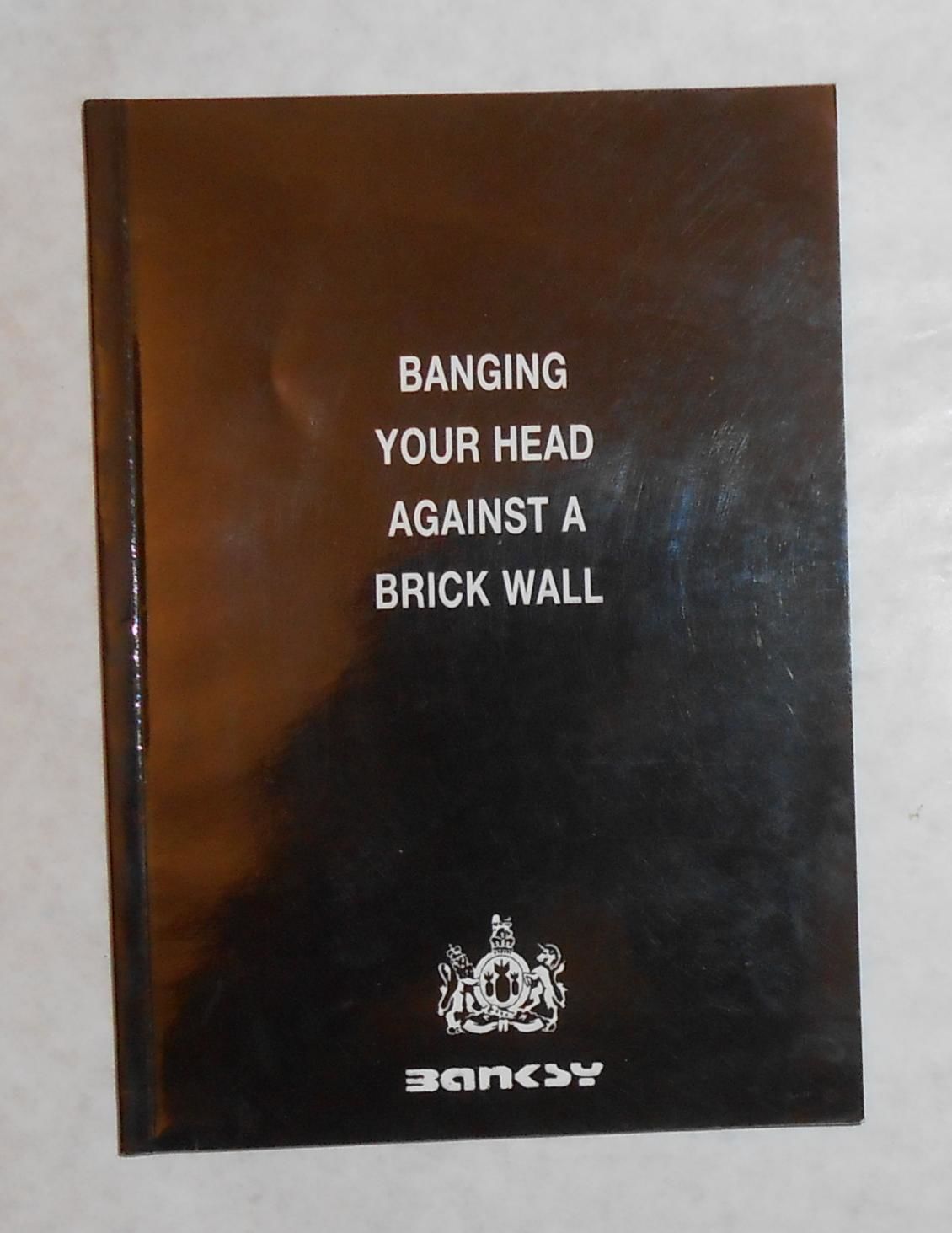 Banging Your Head Against A Brick Wall Banksy (1st Issue) by BANKSY