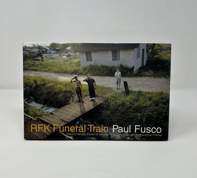 Signed by Fusco on the title page.