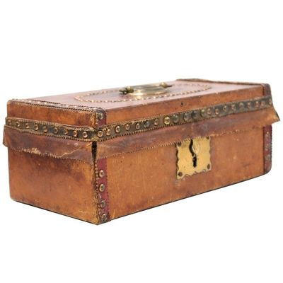 Small leather-covered wooden box with brass lock, decorated with brass tacks, the interior lined with a portion of the Map of the State of Kentucky and the Tennessee Government by Cyrus Harris, engraved by Amos Doolittle for Thomas and Andrews's Boston 1796 edition of Morse's American Geography