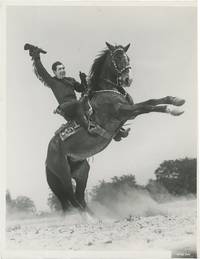 Original publicity photograph of Johnny Mack Brown on a rearing horse by photographer Ray Jones, circa 1935