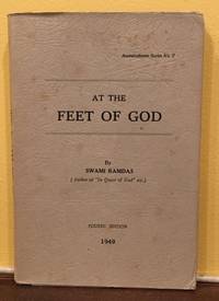 AT THE FEET OF GOD