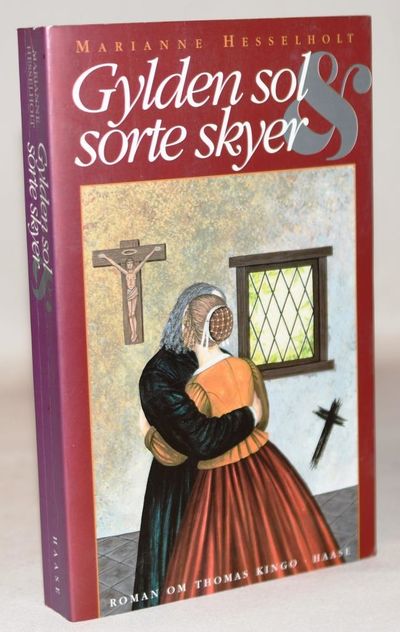 Gylden sol og sorte skyer.