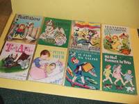 cover of 8 Little Golden Book in French - Un Petit Livre D'Or: Le Caneton Vagabond; Chat Boite; Letit Livre Des Chiens; Tortillou; He Ho Former Le Trio; Je Fais Ma Valise; Ma Petite Soeur; Trois Amis