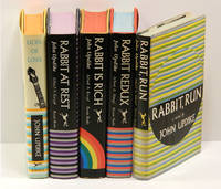 EACH WITH A CARD SIGNED BY UPDIKE LAID IN: RABBIT, RUN (1960); RABBIT REDUX (1971); RABBIT IS...