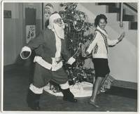 image of (Press photograph): Black Santa Does The Twist with a Black WAC