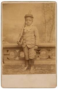 [Cabinet Card photograph]: Well-Dressed Young African-American Boy Standing at Attention with a Toy Rifle and Wearing a military Kepi Cap