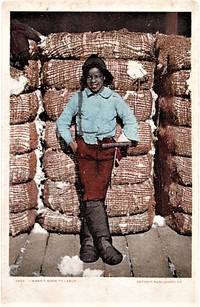 I WASN'T BORN TO LABOR": FULL-COLOR POSTCARD OF AN AFRICAN-AMERICAN BOY IN HIGH BOOTS AND CRUSHED FELT HAT, LEANING AGAINST A PILE OF COTTON BALES