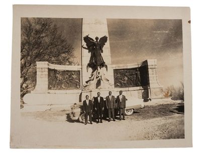 African American civil right activist posed in front of Civil War monument