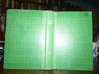 cover of The Tin Woodman of Oz: A Faithful Story of the Astonishing Adventure Undertaken by the Tin Woodman, Assisted by Woot the Wanderer, the Scarecrow of Oz, and Polychrome, the Rainbow's Daughter