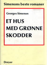 Et hus med grønne skodder