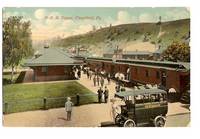 image of PENNSYLVANIA RAILROAD DEPOT IN CLEARFIELD PENNSYLVANIA WITH VINTAGE BUS VINTAGE POSTCARD