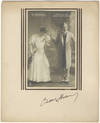 Autograph signature on mount below vintage postcard photograph of characters from the composer's operetta "Ein Walzeertraum.