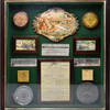 Shadow Box of English angling ephemera including Erolene and Hardy line containers, Lerder metal box, label for Hardy "Deluxe" Fly Rods, 1895 Rule of Angling on the River Dee, etc.
