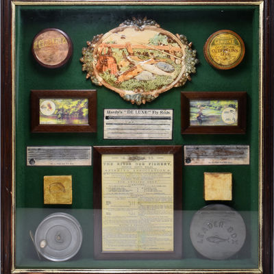 Shadow Box of English angling ephemera including Erolene and Hardy line containers, Lerder metal box, label for Hardy "Deluxe" Fly Rods, 1895 Rule of Angling on the River Dee, etc.