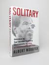 SOLITARY: UNBROKEN BY FOUR DECADES IN SOLITARY CONFINEMENT. MY STORY OF TRANSFORMATION AND HOPE. [Inscribed]