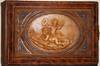Black Forest Photo Album with An Unusual Relief Depicting Putti, One Blowing Bubbles, the Other, Playing Cymbals