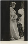 Full-length role portrait photograph of the soprano as the Marschallin with a young blackamoor in Richard Strauss's Der Rosenkavalier. With an autograph inscription signed to verso: "Frau Friedl Ullmann, in memory of May 1, 1970 with many thanks and all good wishes!