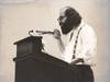 Original photograph of Allen Ginsberg reading "Wichita Vortex Sutra," 1966