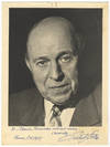 Attractive bust-length photograph of the Austrian composer and conductor in jacket and tie, signed in full, inscribed in dark blue ink to Alexius Fernandes, and dated Vienna, October 1957