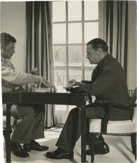 Original press photograph of W. Somerset Maugham and Glenway Wescott playing cards, 1942
