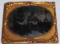 Charming Daguerreotype of Two Women and a Man Leaning against a Beach Wall, in an ornate Rococo Revival Gilded Tin