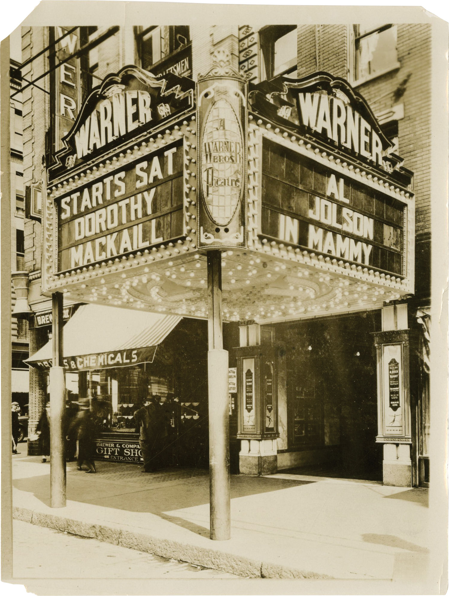 Archive of 14 original photographs of movie theater marquees