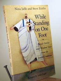 While Standing on One Foot: Puzzle Stories and Wisdom Tales from the Jewish Tradition by Nina Jaffe; Steve Zeitlin - 2012