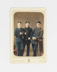 A hand-coloured cabinet photograph (image size 133 × 90 mm) of three men in uniform. The...