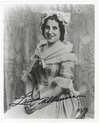 Role portrait photograph of the soprano in Mozart's The Marriage of Figaro. Signed in full
