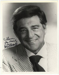 Bust-length photograph, signed in full and inscribed to "Sharon