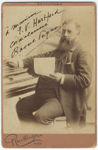 Fine cabinet card photograph by Reutlinger of Paris of the noted pianist seated at the keyboard. With a signed autograph inscription; "à mon E.V. Hartford cordialement Raoul Pugno." Undated, but ca. 1896