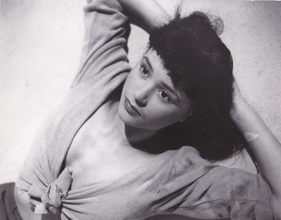 Stockholm: Svensk Filmindustri, 1953. Vintage borderless reference photograph of Harriet Andersson f...