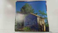 cover of Calendario / Kalender / Calendrier / Calendar: 2011 : Provence (fotos Dominique Zintzmeyer) - lamina 07, House with an ancient advertisement for Meunier chocolate in Vaucluse