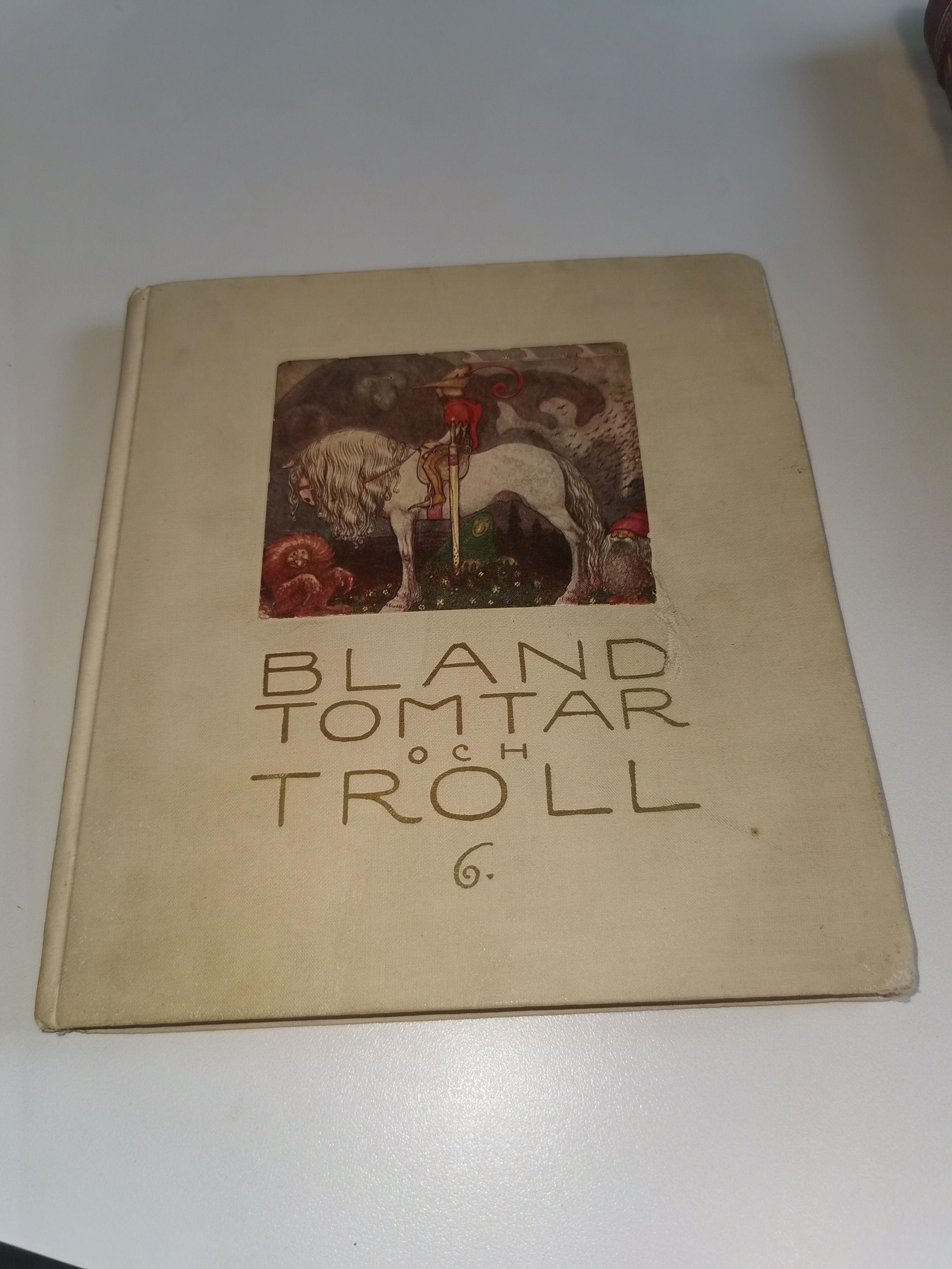 Bland Tomtar Och Troll by John Bauer | White cloth stamped in gold