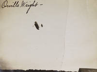 Photograph of the Wright Flyer in flight, signed by Orville