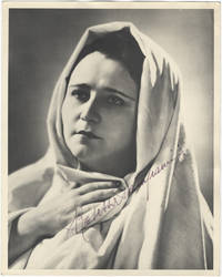 Bust-length role portrait photograph of the soprano as Santuzza in Mascagni's Cavalleria rusticana. Signed in full