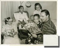 image of Original photograph of Marlon Brando reading to children