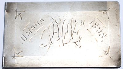 Omaha: Unknown, 1898. Aluminum. Stab binding -- three holes, with leaves secured with brads that pas...