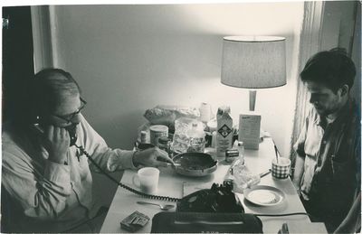Original press photograph of Allen Ginsberg and Peter Orlovsky at home, circa late 1960s