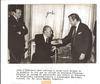 Signed photograph of Borges receiving the gold medal of the Académie Française. Paris, 1979