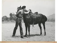 image of Original photograph of Elvis Presley with a horse, circa 1960s