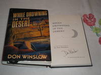 cover of While Drowning In The Desert: Signed
