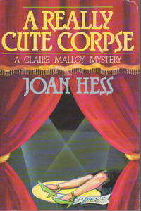 A REALLY CUTE CORPSE. by Joan Hess - First Edition - 1988. - from Bookfever.com, IOBA (SKU: 5796)