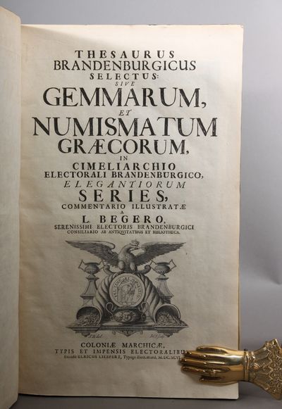 Thesaurus Brandenburgicus Selecturs: Sive Gemmarum et Numismatum Græcorum, in Cimeliarchio Electorali Brandenburgico, Elegantiorum Series, Commentario Illustratæ a L. Begero, Serenissimi Electoris Brandenburgici Consiliario Ab Antiqvitatibus et Bibliotheca. 3 volumes. Part. I-II. Thesauri Elektoralis Brandenburgici Continuatio: Sive Numismatum Romanorum, quae in Cimeliarchio Electorali Brandenburgico asservantur, tam Consularium quam Imperatoriorum, Series Selecta, aere Expressa, et Commentario Illustrata, Authore Laurentio Begero... (10) L + 524 pp + (22) L + (8) L + pp (526-870) + (16) L. Engraved frontisp. and engraved titlevignettes in both volumes. Engraved portrait of Friedrich III in part 1. Engraved folding plate in vol. 1. Richly illustrated with engravings in text. Part III. Thesauri Regii et Electoralis Brandenburgici Volumen Tertium Continens Antiquorum Numismatum et Gemmarum, quæ Cimeliarchio Regio-Electorali Brandenburgico nuper accessere, Rariora : Ut & Suppellectilem Antiquariam Ubberimam,  (photo 2)
