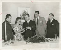 cover of Mrs. Miniver (Original photograph of William Wyler, Walter Pidgeon, and Jan Struther accepting awards at Radio City Music Hall for the 1942 film)